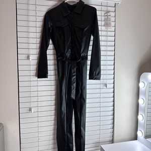 Patent leather fitted black jumpsuit